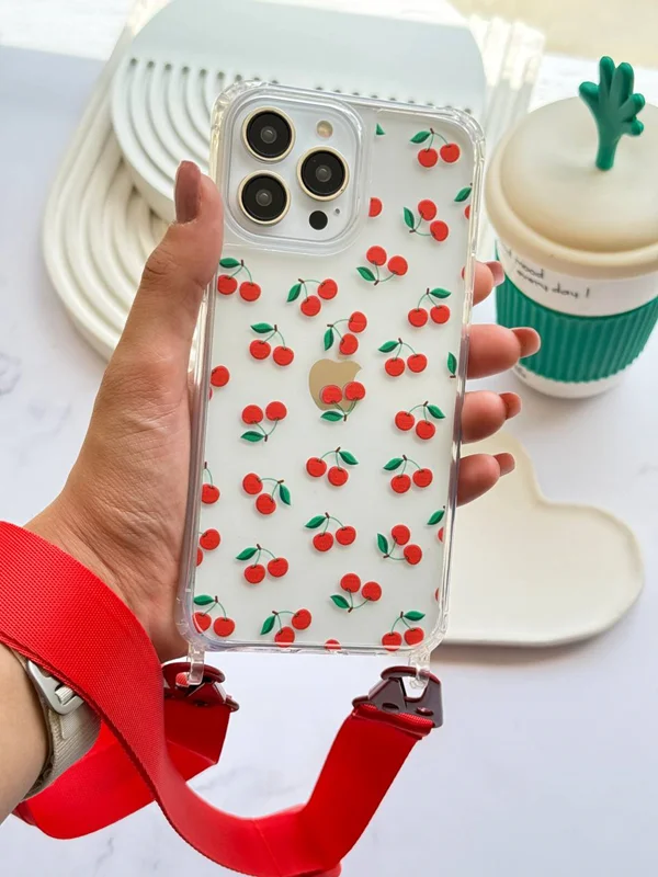 قاب گوشی شفاف دو قلاب طرح آلبالو با بند قرمز (سفارشی)